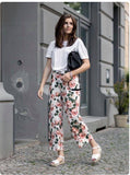 Courtney Terno  (floral pants with shirt)