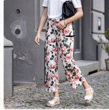 Courtney Terno  (floral pants with shirt)